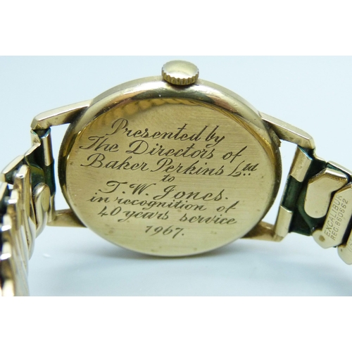 1010 - A 9ct gold cased Longines wristwatch, the case back bears inscription dated 1967, 32mm case