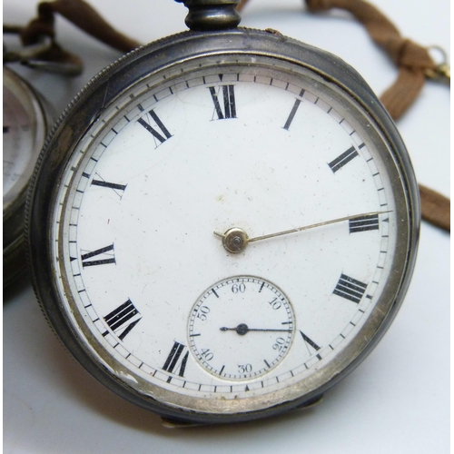 1022 - Two silver cased pocket watches including a Waltham Traveler lacking hour hand