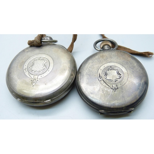 1022 - Two silver cased pocket watches including a Waltham Traveler lacking hour hand