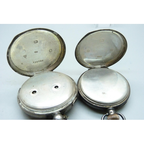 1022 - Two silver cased pocket watches including a Waltham Traveler lacking hour hand