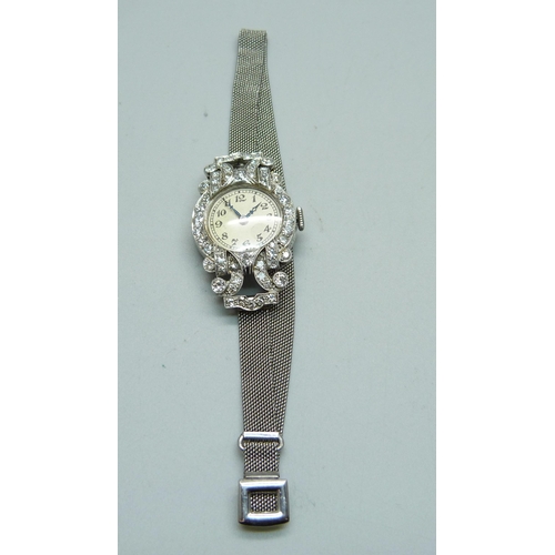 1032 - A lady's Art Deco platinum and diamond set cocktail wristwatch, inscription to case back 'D.M.S. 2:1... 