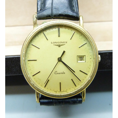 1049 - A gentleman's Longines quartz wristwatch on a leather strap, boxed