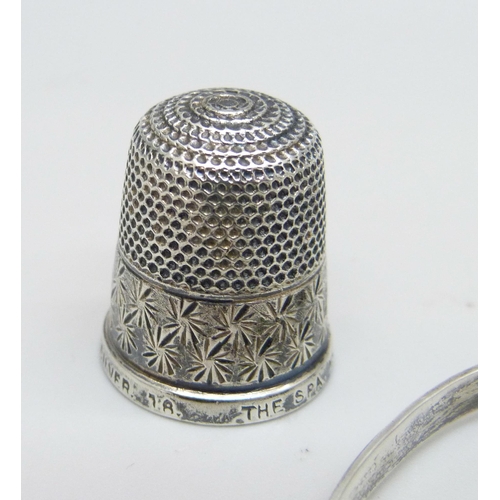 1064 - A hallmarked silver pencil, a plated Evesharp pencil, a silver bangle and a silver thimble