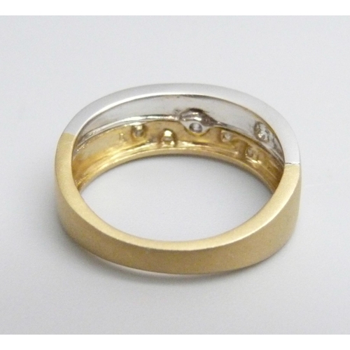 1079 - A 9ct gold and diamond ring, 3.5g, P