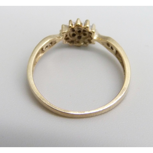 1095 - A 9ct gold and diamond ring, 1.5g, M