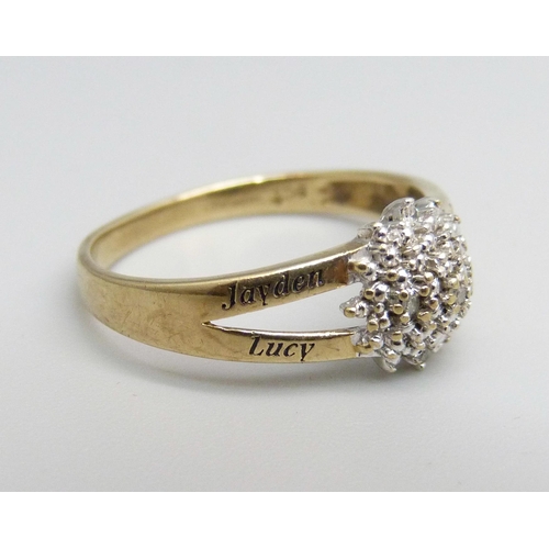 1100 - A 9ct gold and diamond ring, 1.9g, O