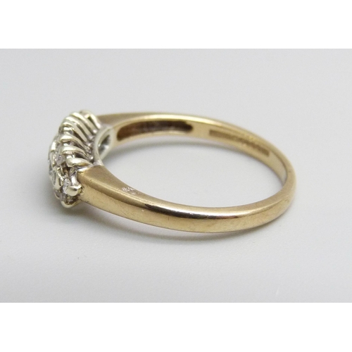 1103 - A 9ct gold and diamond ring, 2.3g, L/M, lacking one small diamond