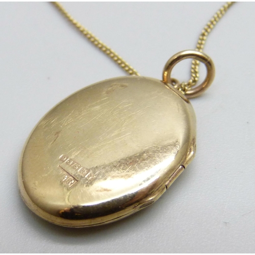 1107 - A 9ct gold locket and chain, 3.6g, chain 36cm