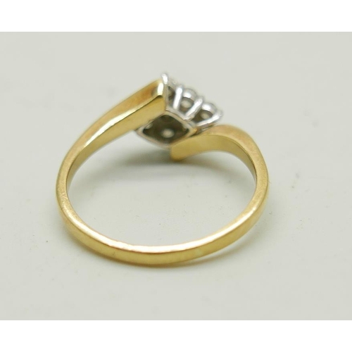 1116 - An 18ct gold and nine diamond ring, 5.3g, S/T