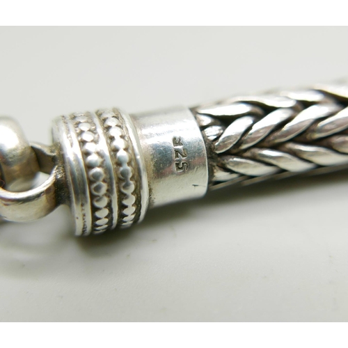 1127 - A gentleman's heavy silver rope bracelet, 92g