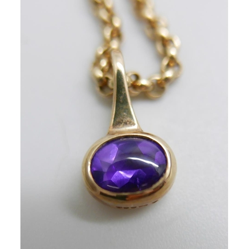 1150 - A 9ct gold and amethyst pendant and chain, 8.2g, chain 39cm, boxed