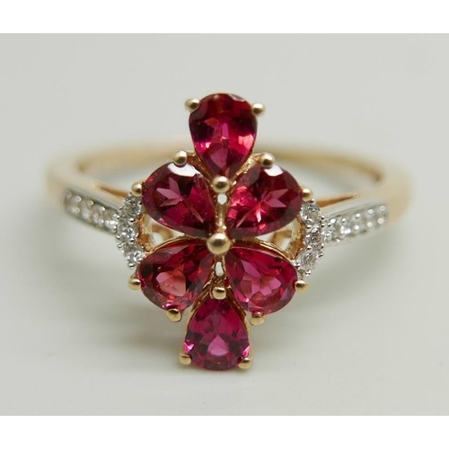 1152 - A 9ct gold and Almandine garnet ring, 2.2g, N/O