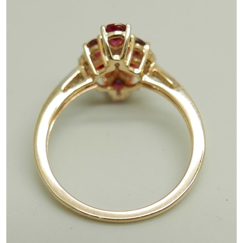 1152 - A 9ct gold and Almandine garnet ring, 2.2g, N/O