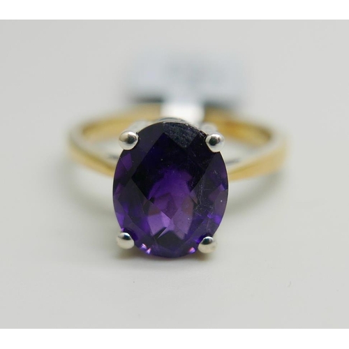 1170 - A silver gilt and amethyst solitaire ring, N