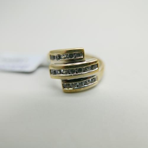 1175 - A silver gilt, three row zircon ring, N