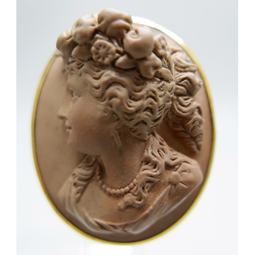 1180 - An antique lava cameo brooch and one other cameo brooch