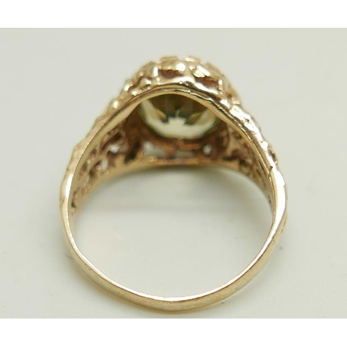 1184 - A 9ct gold stone set ring, 4.8g, P