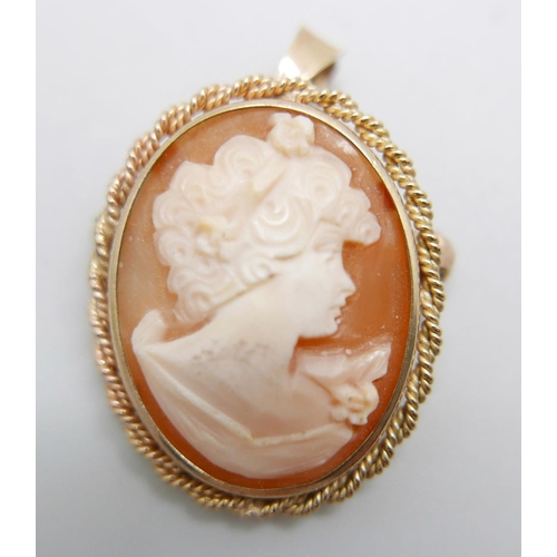 1185 - A 9ct gold mounted cameo brooch, 4.1g