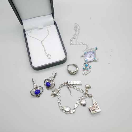 1212 - Silver jewellery; a pendant and chain x2, earrings, ring and charm bracelet