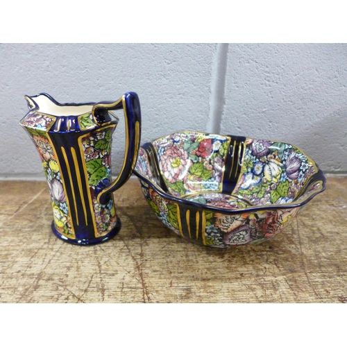 1222 - A Mason's Decoupage jug and bowl, two similar vases, one a/f, a glass vase, novelty salt, pepper and... 