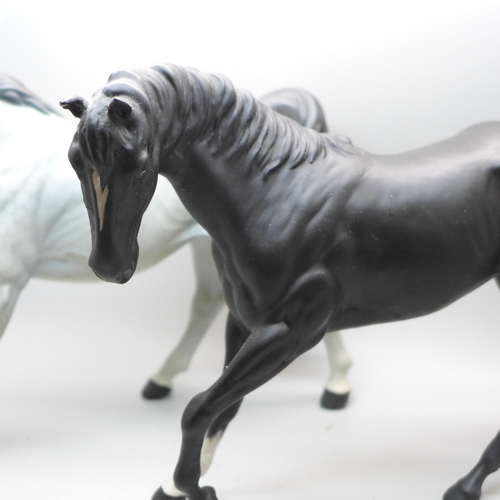 614 - Two Beswick horse figures, hind leg on black horse restored