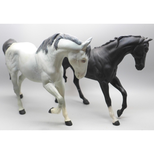 614 - Two Beswick horse figures, hind leg on black horse restored