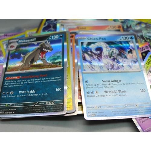 622 - Over 700 Pokemon cards in tins, with holos (two tins)