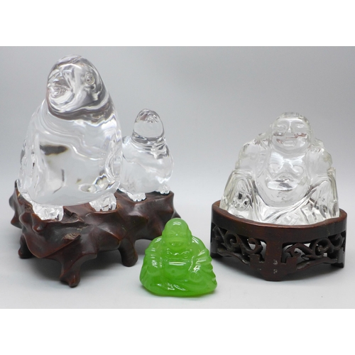 648 - Two rock crystal mounted figures; Buddha and a pair of birds, tiny chip to beak and a small green gl... 