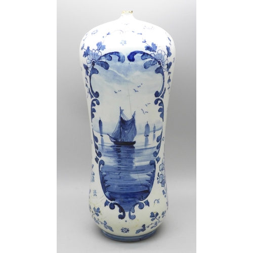 649 - A Royal Bonn blue and white bottle, 21cm, a/f