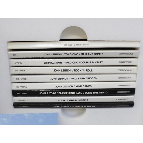 664 - A John Lennon Signature Box compilation CD box set and The Beatles Anthology CD set