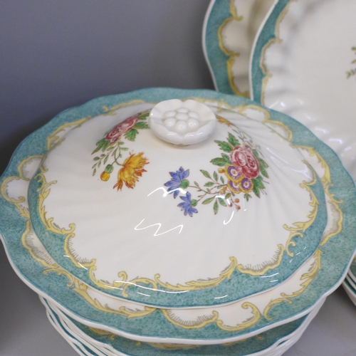 667 - Royal Doulton Kingswood D3601 part dinner service with two tureens and two graduated serving plates,... 