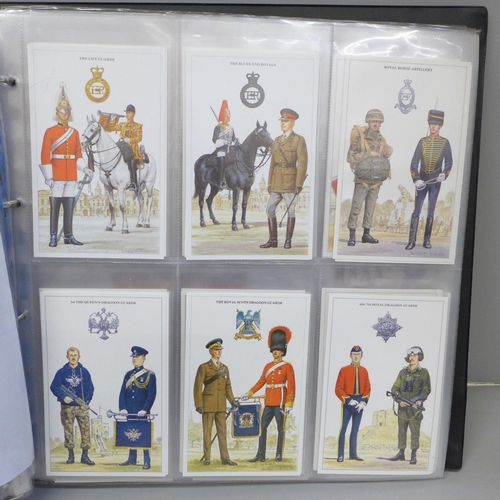 679 - Postcards; a large album of military related postcards, vintage to modern