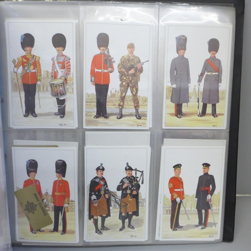 679 - Postcards; a large album of military related postcards, vintage to modern