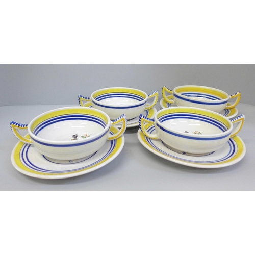 680 - A set of four early Quimper soup bowls and saucers, Henriot Quimper