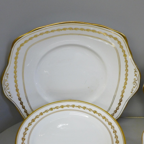 681 - A Royal Albert 5430 tea service comprising two cake plates, twelve tea plates, eleven saucers, nine ... 