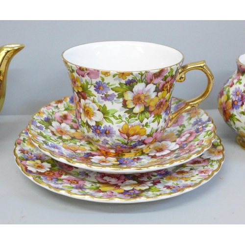 688 - A James Kent chintz teaset for one, a Du Barry pattern chintz teapot, cream jug, sugar bowl, side pl... 