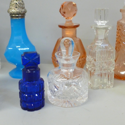 691 - A collection of scent bottles and a glass cigarette box