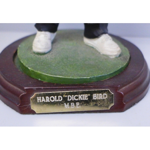 692 - A Royal Doulton figure of Harold 'Dickie' Bird, MBE on stand