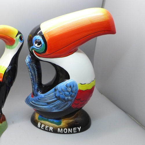 705 - Guinness advertising items; a Carlton Ware Toucan figure, a Toucan Beer Money box, a Mintons matchbo... 