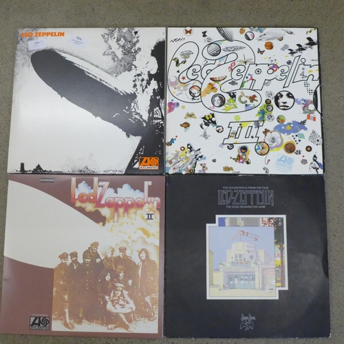 711 - Four Led Zeppelin LP records; three re-issues comprising two tri-fold and a double and soundtrack, T... 