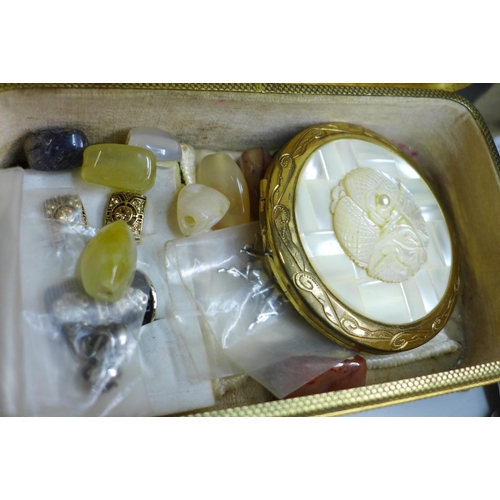 714 - A gilt metal jewellery casket, costume jewellery, wristwatch, pens, spoons, fish knives and forks, e... 