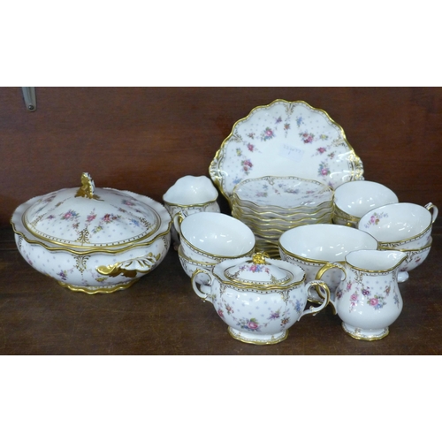 718 - A Royal Crown Derby Antoinette tea set with oval tureen, 2 x cream and sugar and bread and butter pl... 