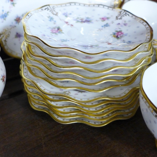 718 - A Royal Crown Derby Antoinette tea set with oval tureen, 2 x cream and sugar and bread and butter pl... 