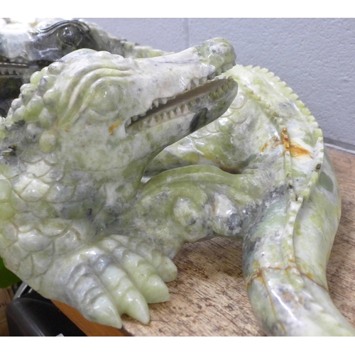 724A - A large carved Chinese jade model of two entwined crocodiles, tail and back claw a/f, 66cm, 35kg **P... 