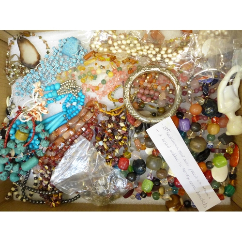 743 - Two boxes of costume jewellery; semi-precious stone necklaces, Indian jewellery, brass and copper ci... 