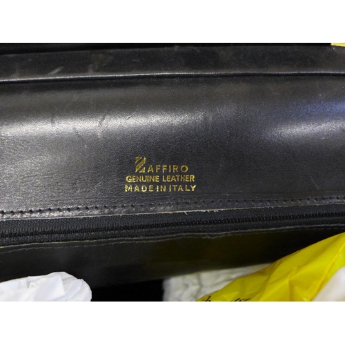 749 - A leather weekend bag and one smaller marked Zaffiro