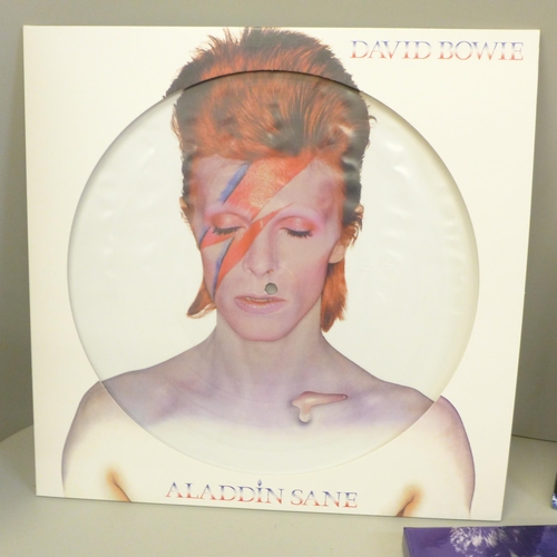 755 - David Bowie, Space Oddity two-single box set and a limited edition picture disc, Planet Earth Is Blu... 