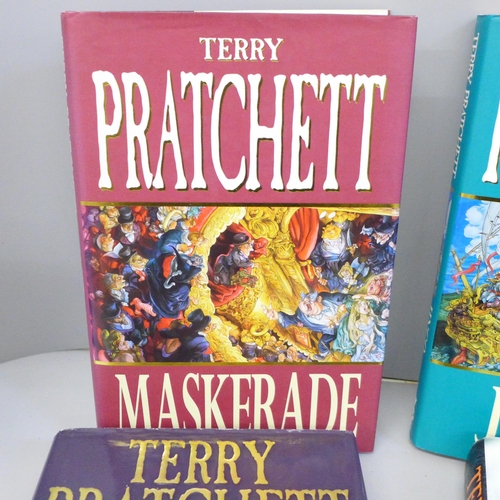 767 - Four hardback first edition Discworld novels by Terry Pratchett with a signed paperback - Maskerade ... 