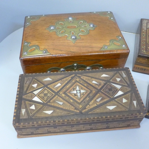 768 - Six boxes; three inlaid wooden boxes, an oriental carved wooden box, a metal inlaid box and one othe... 