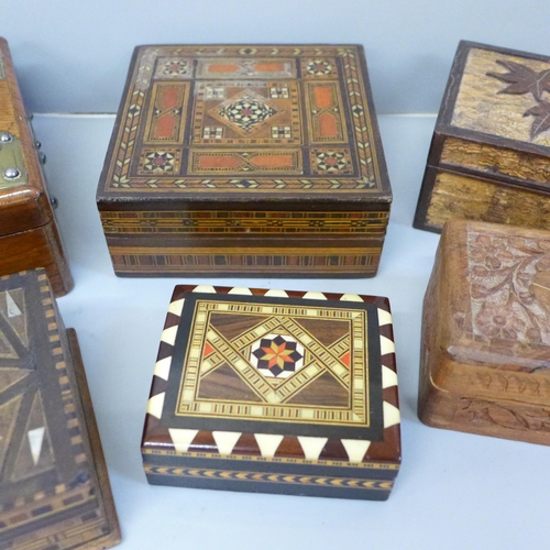 768 - Six boxes; three inlaid wooden boxes, an oriental carved wooden box, a metal inlaid box and one othe... 